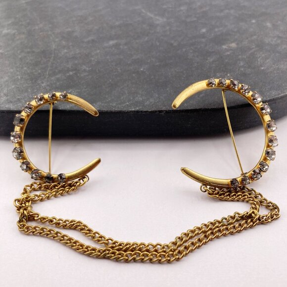 Antique Jewelry - ANTIQUE Gold tone metal grey rhinestone crescent moon chain brooch ~ Vintage pin